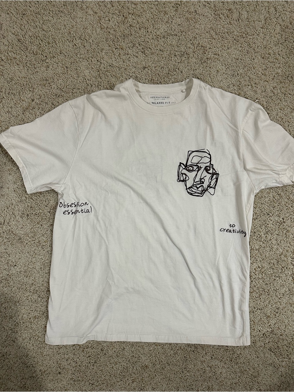 100% Cotton White Graphic Men’s T-Shirt with Embroidered Abstract Face Design